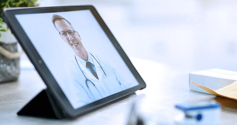 marcacao de consultas medicas online medico sorrindo